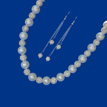 Load image into Gallery viewer, handmade pearl and crystal necklace accompanied by a pair of multi-strand crystal drop earrings