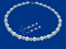 Load image into Gallery viewer, handmade crystal and pearl necklace accompanied by a pair of crystal drop earrings