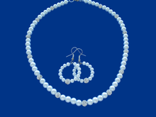 Load image into Gallery viewer, handmade pearl and crystal necklace accompanied by a pair of hoop earrings