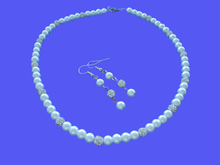 Load image into Gallery viewer, A handmade pearl and crystal necklace accompanied by a pair of drop earrings, custom color