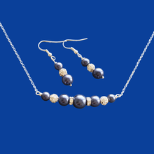 Load image into Gallery viewer, handmade pearl and crystal bar necklace accompanied by a pair of drop earrings