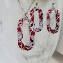 Load image into Gallery viewer, Handmade real flower oval pendant necklace accompanied by a matching pair of dangling stud earrings made with rose petals and silver flakes preserved in resin. - Jewelry Sets, Resin Flower Jewelry, Necklace Set