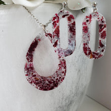 Load image into Gallery viewer, Handmade real flower teardrop pendant necklace accompanied by a pair of oval stud earrings made with rose petals and silver flakes preserved in resin. Necklace And Earring Set, Resin Flower Jewelry