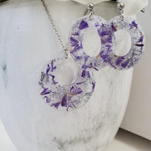 Load image into Gallery viewer, Handmade real flower circular pendant necklace accompanied by a pair of oval stud drop earrings made with purple statice and silver flakes preserved in resin. - Flower Jewelry, Red Jewelry, Jewelry Sets