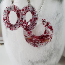 Load image into Gallery viewer, Handmade real flower circular pendant necklace accompanied by a pair of oval stud drop earrings made with rose petal and silver flakes preserved in resin. - Flower Jewelry, Purple Jewelry, Jewelry Sets