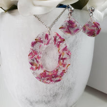 Load image into Gallery viewer, Handmade real flower oval pendant necklace accompanied by a pair of shell shape stud earrings made with red clover flowers and silver flakes preserved in resin. - Jewelry Sets, Flower Jewelry, Blue Jewelry