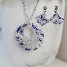 Load image into Gallery viewer, Handmade real flower circular pendant necklace accompanied by a pair of shell shape stud drop earrings made with blue cornflower and silver flakes preserved in resin. - Jewelry Sets, Flower Jewelry, Purple Jewelry