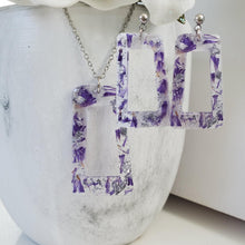 Load image into Gallery viewer, Handmade real flower rectangular pendant necklace accompanied by a matching pair of stud earrings made with purple statice and silver flakes. Blue Jewelry, Flower Jewelry, Jewelry Sets