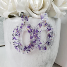 Load image into Gallery viewer, Handmade real flower long oval post earrings made with purple statice and silver flakes preserved in resin. - Long Earrings, Purple Earrings, Flower Stud Earrings