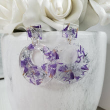 Load image into Gallery viewer, Handmade real flower circular stud drop earrings made with purple statice and silver leaf preserved in resin. - Long Earrings, Blue Earrings, Dangle Earrings