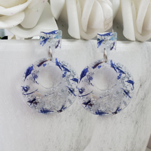 Load image into Gallery viewer, Handmade real flower circular stud drop earrings made with blue cornflower and silver leaf preserved in resin.  - Long Earrings, Blue Earrings, Dangle Earrings