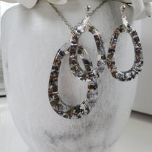 Load image into Gallery viewer, Handmade real flower teardrop necklace and post earring jewelry set made with lavender petals and silver leaf preserved in resin. - Teardrop Jewelry, Resin Jewelry, Jewelry Sets