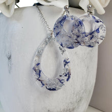 Load image into Gallery viewer, Handmade real flower teardrop pendant accompanied by a pair of circular stud earrings made with blue cornflower and silver leaf preserved in resin. - Flower Jewelry, Jewelry Set, Bridal Sets