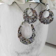Load image into Gallery viewer, Handmade real flower teardrop pendant accompanied by a pair of circular stud earrings made with lavender petals and silver leaf preserved in resin. - Flower Jewelry, Jewelry Set, Bridal Sets