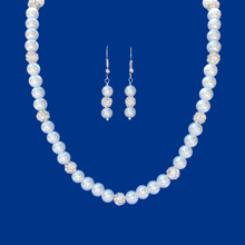 Load image into Gallery viewer, handmade pearl and crystal necklace accompanied by a pair of drop earrings