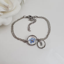 Load image into Gallery viewer, Handmade real flower monogram charm bracelet made with forget me not flowers preserved in resin. stainless steel or gold - Forget Me Not Bracelet - Letter Bracelet - Bracelet