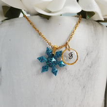 Load image into Gallery viewer, Handmade monogram snowflake glitter necklace made with blue glitter preserved in resin. - Monogram Snowflake Necklace-Winter Jewelry-Necklaces
