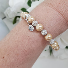 Load image into Gallery viewer, Handmade pearl and pave crystal rhinestone bracelet with tiny leaf charm - champagne or custom color - Personalized Pearl Bracelet - Letter Bracelet
