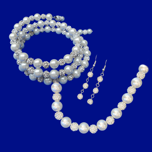 handmade pearl and crystal necklace accompanied by an expandable, multi-layer, wrap bracelet and a pair of drop earrings
