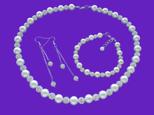 Load image into Gallery viewer, A handmade pearl and crystal necklace accompanied by a matching bracelet and crystal drop earring jewelry set, silver and ivory or silver and custom color
