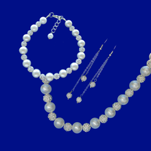 Load image into Gallery viewer, A handmade pearl and crystal necklace accompanied by a matching bracelet and crystal drop earring jewelry set, silver and ivory or silver and custom color
