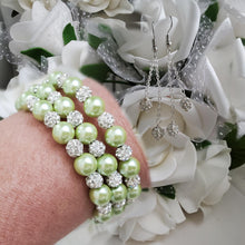Load image into Gallery viewer, Handmade pearl and pave crystal rhinestone expandable, multi-layer, wrap bracelet accompanied by a pair of double-strand crystal drop earrings, light green or custom color - Bracelet Sets - Bride Gift - Bridal Gift Ideas