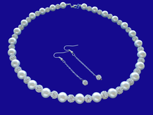 Load image into Gallery viewer, A handmade pearl and crystal necklace accompanied by a pair of crystal drop earrings. 