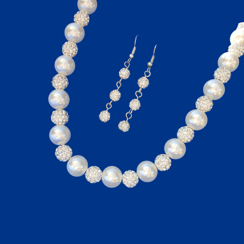 handmade crystal and pearl necklace accompanied by a pair of crystal drop earrings