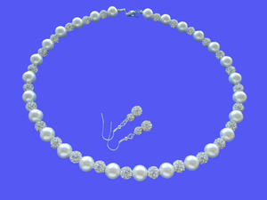 A handmade pearl and crystal necklace accompanied by a pair of crystal earrings. 