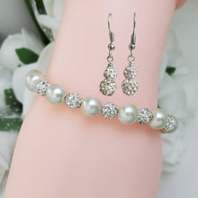 Load image into Gallery viewer, Handmade pearl and pave crystal rhinestone bracelet accompanied by a pair of crystal drop earrings, ivory and silver or custom color - Pearl Set - Bracelet Set - Earring Set - Pearl Jewelry Set