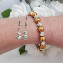 Load image into Gallery viewer, Handmade pearl and pave crystal rhinestone bracelet accompanied by a pair of crystal drop earrings, copper and silver or custom color - Pearl Set - Bracelet Set - Earring Set - Pearl Jewelry Set