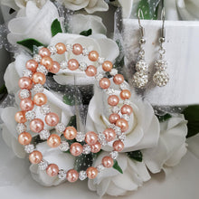 Load image into Gallery viewer, Handmade pave crystal rhinestone and pearl expandable, multi-layer, wrap bracelet accompanied by a pair of crystal drop earrings - powder orange or custom color - Pearl Bracelet Set - Bracelet and Earrings - Bride Gift