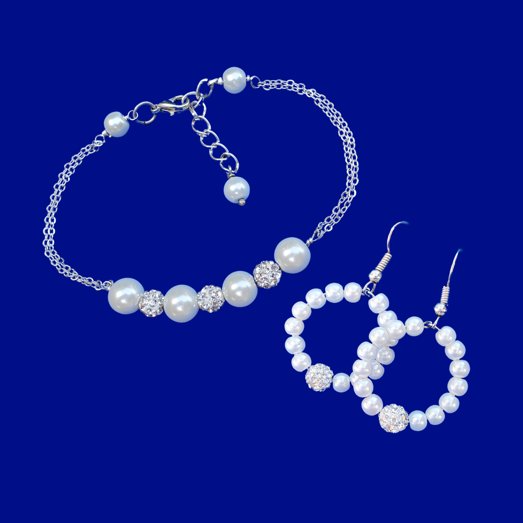 handmade pearl and crystal bar bracelet accompanied by a pair of hoop earrings