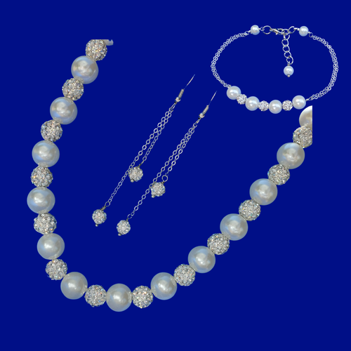 handmade pearl and crystal necklace accompanied by a bar bracelet and a pair of crystal drop earrings