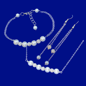 A handmade crystal and pearl necklace accompanied by a matching bracelet and a pair of drop earrings. This elegant jewelry set will make gorgeous bridal gifts.