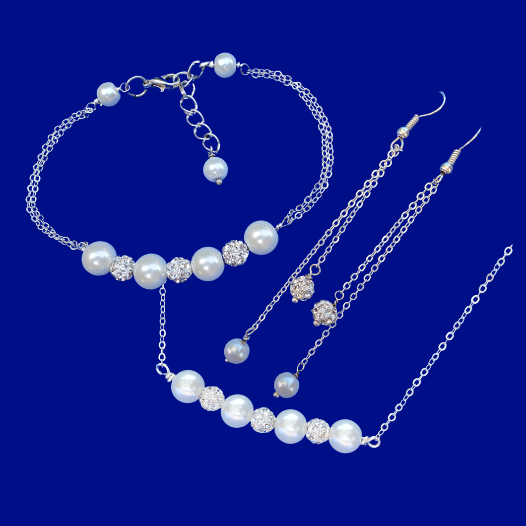 A handmade crystal and pearl necklace accompanied by a matching bracelet and a pair of drop earrings. This elegant jewelry set will make gorgeous bridal gifts.