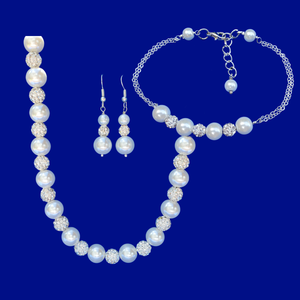 handmade pearl and crystal necklace accompanied by a bar bracelet and a pair of drop earrings