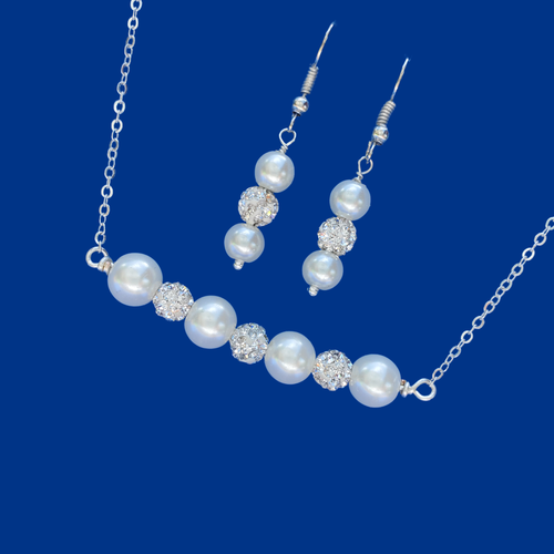A pearl and crystal bar bracelet accompanied by a pair of drop earrings. silver and white or silver and custom color