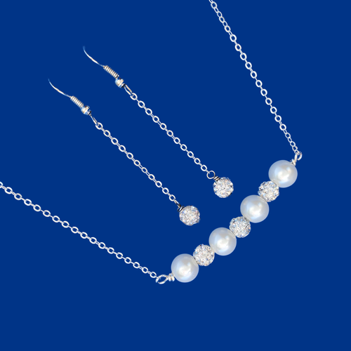 handmade pearl and crystal bar necklace accompanied by a pair of crystal drop earrings