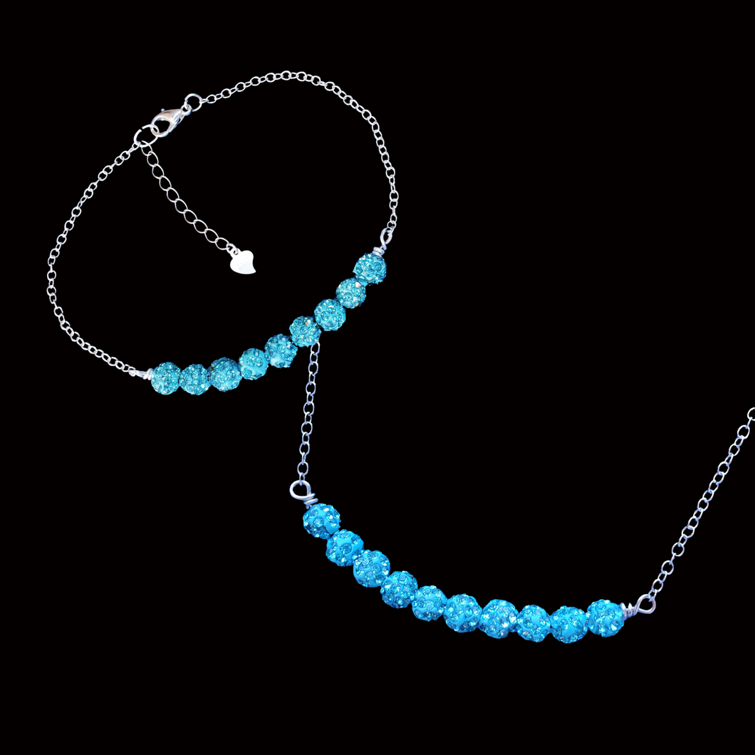 A handmade crystal bar necklace accompanied by a matching bar bracelet. aquamarine blue or custom color