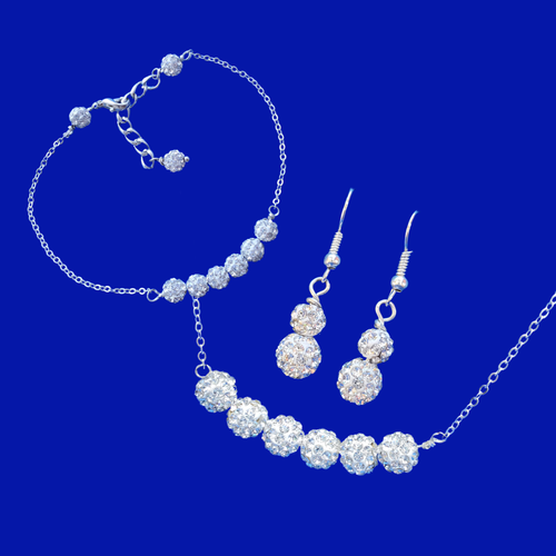 crystal bar necklace accompanied by a matching bracelet and a pair of drop earrings, silver clear
