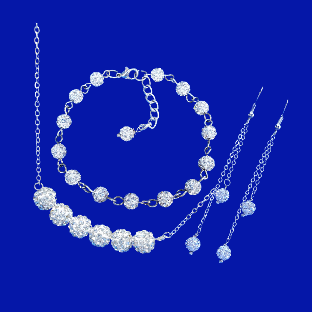 handmade crystal bar necklace accompanied by a bracelet and a pair of multi-strand drop earrings
