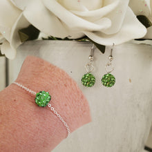 Load image into Gallery viewer, Handmade pave crystal rhinestone floating bracelet accompanied by a pair of dangle earrings. - Peridot (green) or custom color - Earring Sets - Jewelry Set - Bracelet Set