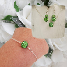 Load image into Gallery viewer, Handmade floating pave crystal rhinestone floating necklace accompanied by a matching bracelet and a pair of drop earrings - peridot or custom color - Jewelry Sets - Necklace Sets - Bridal Sets