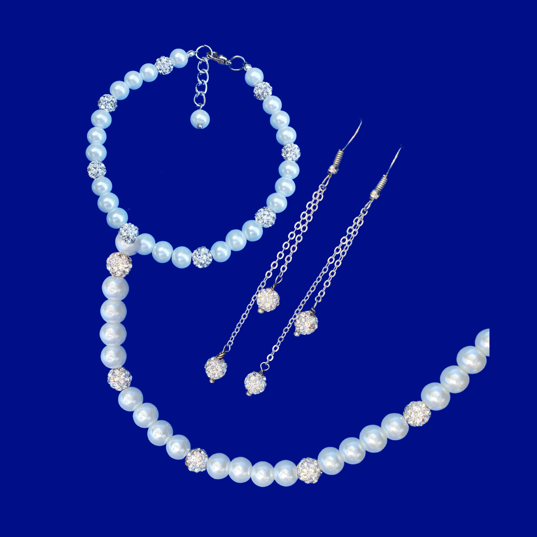 pearl and crystal necklace accompanied by a matching bracelet and a pair of multi-strand crystal earrings