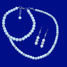 Load image into Gallery viewer, handmade pearl and crystal necklace with a 5 inch backdrop accompanied by a matching bracelet and a pair of drop earrings