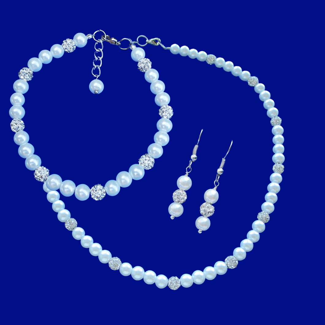 handmade pearl and crystal necklace with a 5 inch backdrop accompanied by a matching bracelet and a pair of drop earrings