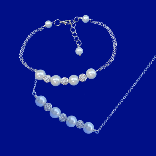 handmade pearl and pave crystal rhinestone bar necklace accompanied by a matching bracelet