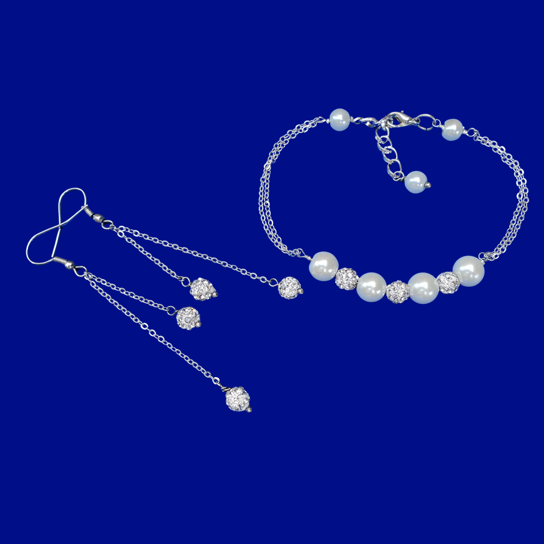 handmade pearl and crystal bar bracelet accompanied by a pair of multi-strand drop earrings