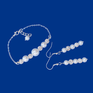 handmade crystal and pearl bar bracelet accompanied by a pair of drop earrings